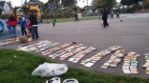 Books laid out for the taking  at Bella Vista park, from the elementary school
