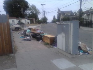 Pile of dumped garbage on E 27th