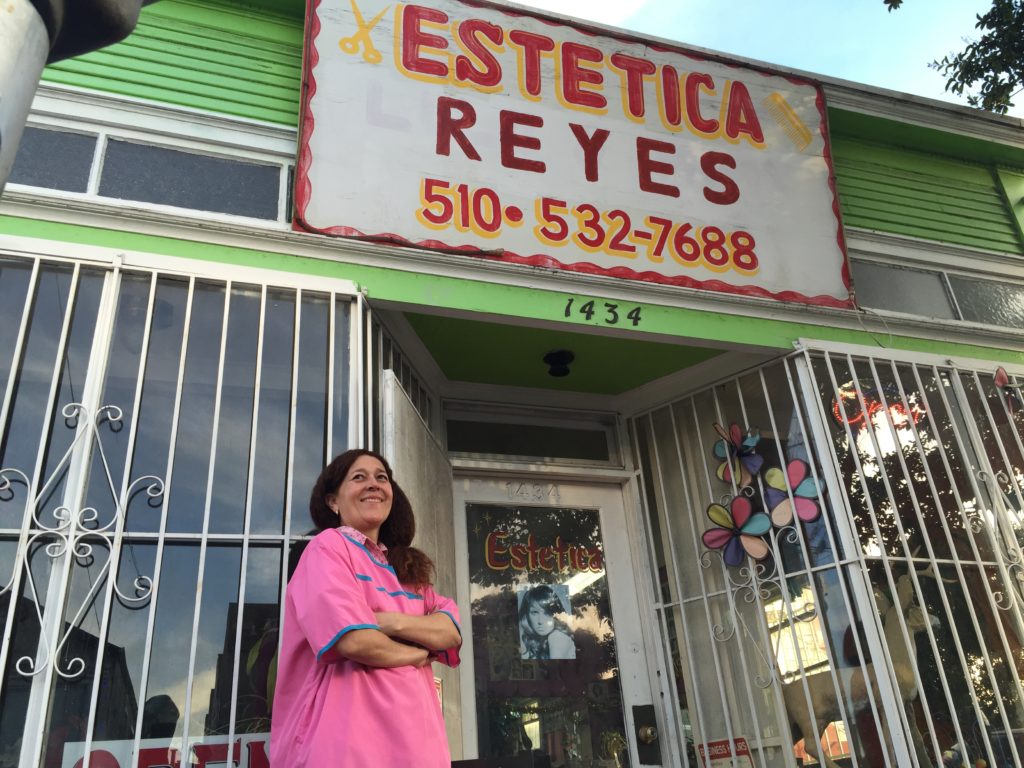 Ana Reyes in front of her shop
