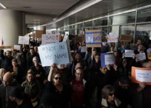 Protesters at SFO 2017.3.10 Source Getty AFP