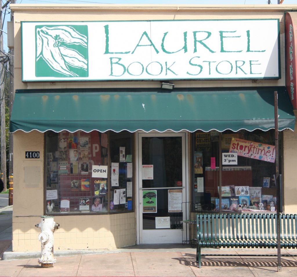 An image of a small bookstore with "Laurel Book Store" on the front.