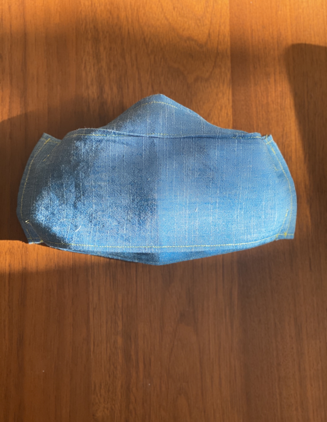 a light demin blue fabric mask