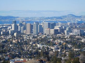 A high up view of downtown Oakland with clear skies